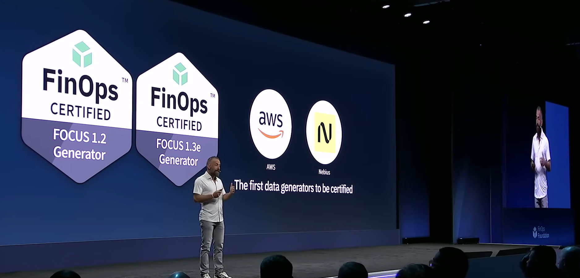 Storment announcing AWS and Nebius as the first two billing-data generators to earn FOCUS Certified Generator status at FinOps X 2026